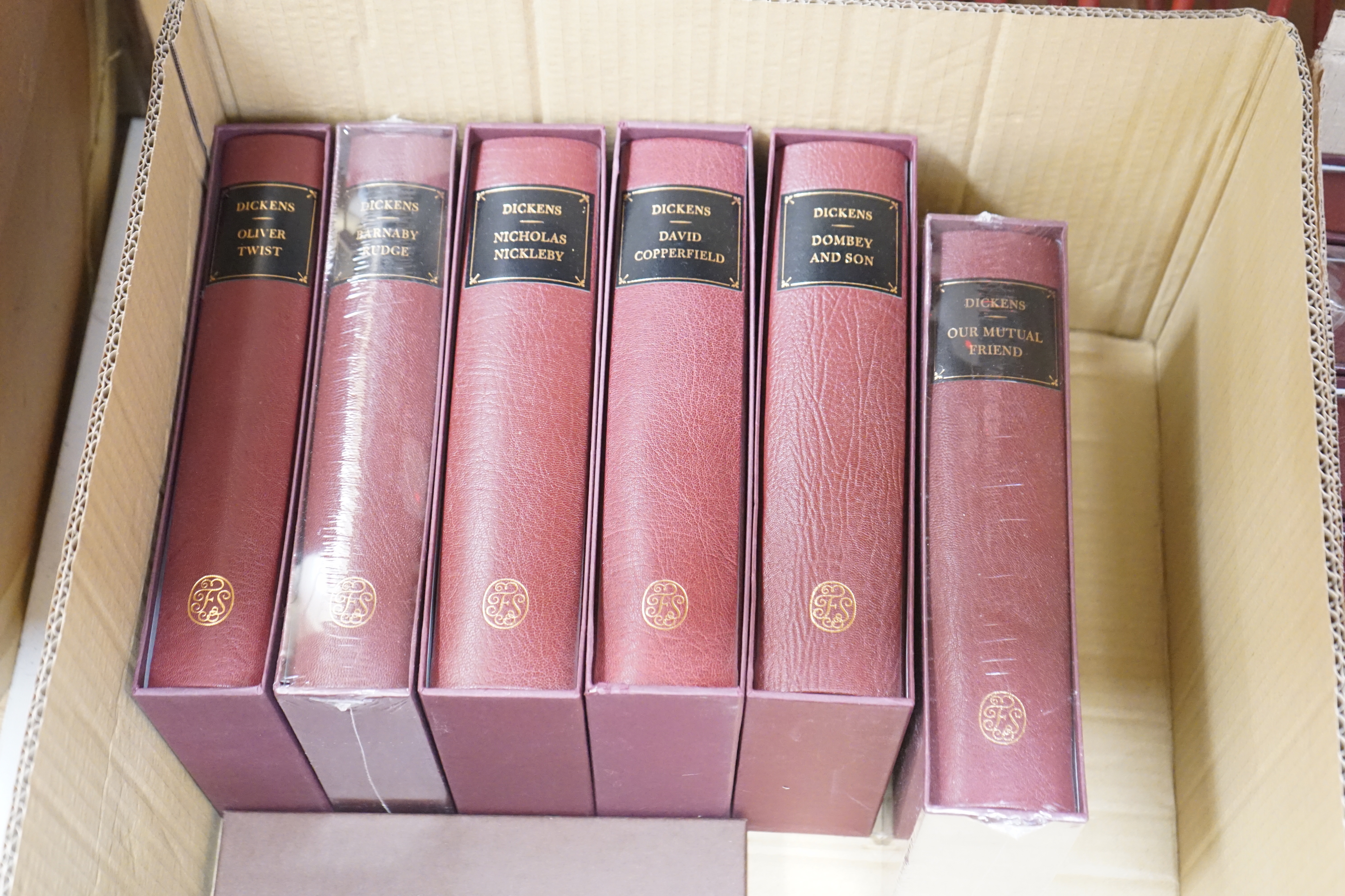 A collection of Charles Dickens folio society books including Bleak House, Great Expectations and Dicken’s London